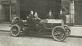 Henry B. Harris (left) and James Bernard Fagan (right) standing beside Harris' racing automobile.jpg