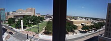 The former Midland County Courthouse on Wall Street, looking north from Midland Doubletree towers Midland County Courthouse, Midland, TX (on left) looking north across Wall Street from Midland Hilton.JPG