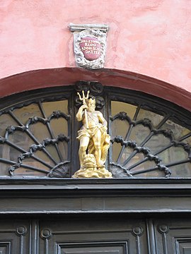 Detail of the Neptune figure above the gate.