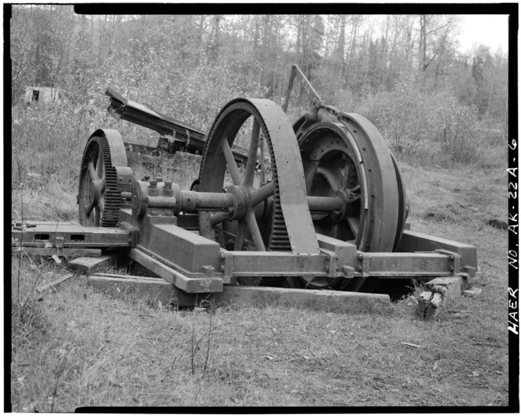 File:OBLIQUE VIEW OF HOIST, SHOWING WOODEN BRAKE SHOES, REDUCTION GEARS AND BED FOR (MISSING) CLUTCH-DRIVE GEAR UNIT, LOOKING NORTHWEST - Buffalo Coal Mine, Vulcan Cable Hoist, Wishbone Hill, Southeast end HAER AK,13-SUTT,1-A-6.tif