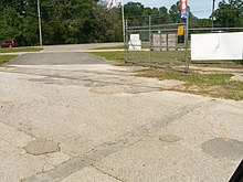 The last remaining rails of the Tallahassee Railroad in a parking lot in southern Tallahassee Old Tallahassee-St Marks Railroad rails.jpg