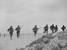 British paratroopers advance in line abreast. Parachute training North Africa1943.jpg