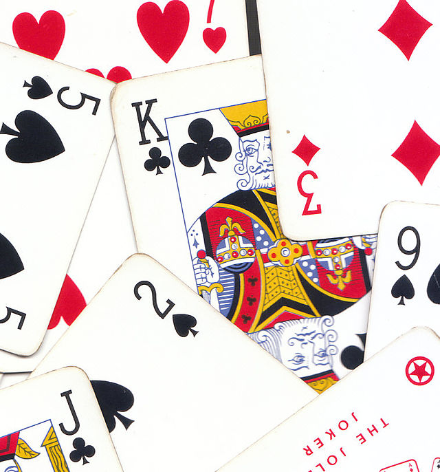 How many king, queen, jack and ace cards are present in each set