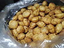 Puri which is used in making Panipuri. This puri is made of aata. Place: Meerut, Uttar Pradesh, India.