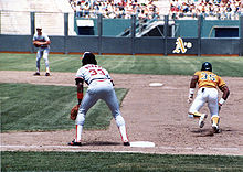 Hall of fame left fielder Rickey Henderson attempting a steal. Henderson holds both the single season and career stolen base records. Rickey Henderson and Eddie Murray, 1983.jpg