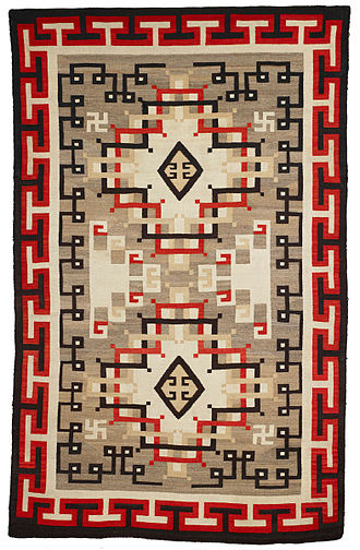 A Navajo wool rug in the Early Crystal style, including swastikas in the design, date 1900-1920 AD RugNavajo-BMA.jpg