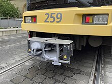 Scharfenberg coupler on a DUEWAG GT6-70D/N low floor tram. Note the partially worn off Schaku logo on the right. Schaku on a GT670DN.jpg