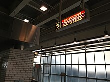 Sign for escalator to Red, Purple, and Brown lines (37262336344).jpg