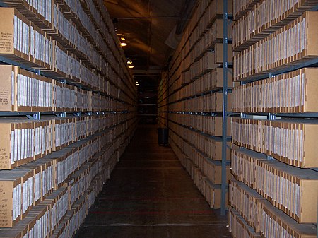 Archived Cores are stored on shelves like books, allowing for quick and easy retrieval. Slabbed cores.JPG