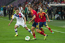 Monreal taking on Chile's Eduardo Vargas in a 2013 friendly Spain - Chile - 10-09-2013 - Geneva - Eduardo Vargas, Ignacio Monreal and Andres Iniesta.jpg