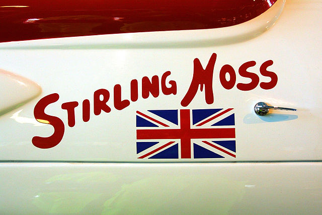 "Stirling Moss" script and a British flag on a 1958 Maserati 420M/58 he raced in the Race of Two Worlds on Monza. The very same script was printed on 