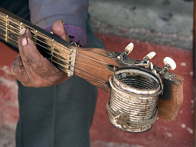 Gitarre of street musician detail