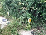 Two 20th century UK gas pipeline marker posts. The yellow colour is usually reserved for the Local Transport System (LTS).jpg