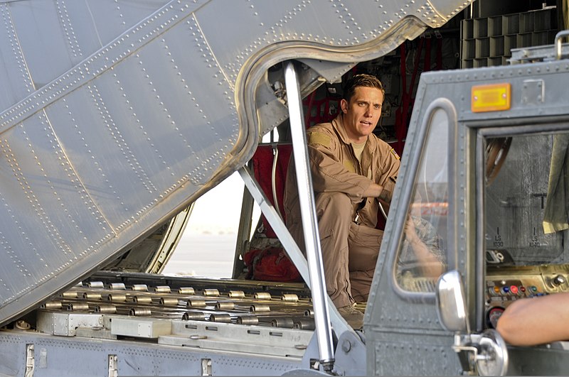 File:U.S. Air Force Staff Sgt. Johnny Bond, a loadmaster with the 737th Expeditionary Airlift Squadron, guides the driver of a pallet truck to the back of a C-130J Super Hercules aircraft in Southwest Asia June 29 140629-F-XR107-011.jpg