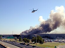 Smoke billowing out of The Pentagon, where 125 workers died. The Washington Monument can be seen in the distance. US Navy 010911-N-6157F-006 Pentagon damage, Sept. 11, 2001.jpg