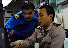 Naval liaison officers from Malaysia and Thailand coordinate efforts US Navy 090817-N-5207L-080 Naval liaison officers from Malaysia and Thailand coordinate efforts aboard the amphibious dock landing ship USS Harpers Ferry (LSD 49).jpg