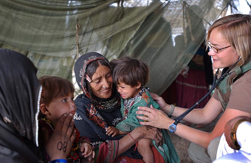 File:US specialist helping Afghan nomads.jpg