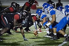 Players from Valdosta State University and Shorter University line up during a military appreciation game, November 12, 2016. VSU honors vets, shuts down Hawks (161112-F-EJ242-391).jpg
