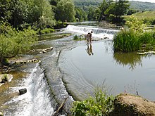 Swimmers at the weir Warleigh Weir, Bath, England arp.jpg