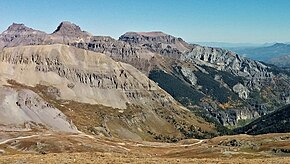 South aspect of Whitehouse Mountain centered in the distance, view from Imogene Pass. Teakettle Mountain, Potosi Peak, and United States Mountain on left. Whitehouse Mtn from Imogene Pass.jpg