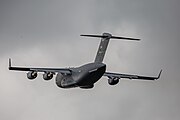 A Boeing C-17 Globemaster III, tail number 95-0103, taking off from RAF Mildenhall in the United Kingdom. It is assigned to the 62nd Airlift Wing and the 446th Airlift Wing at Joint Base Lewis McChord in Washington, USA.