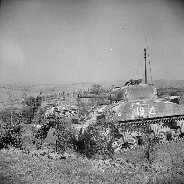 Two Sherman tanks of the 6th Royal Tank Regiment in action against German machine gun positions on the walls of San Marino, during the Battle of San M