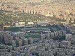 Al-Fayhaa Stadium in Damascus, Syria as seen from Mount Qasioun.jpg