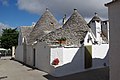 * Nomination Italy, Alberobello, Trullo (Trulli) --Berthold Werner 12:07, 17 March 2018 (UTC) Comment I suggest to crop the palm branch in the top left corner out.--Ermell 15:43, 17 March 2018 (UTC)  Done --Berthold Werner 12:11, 19 March 2018 (UTC) * Promotion Good quality. --Ermell 08:23, 20 March 2018 (UTC)