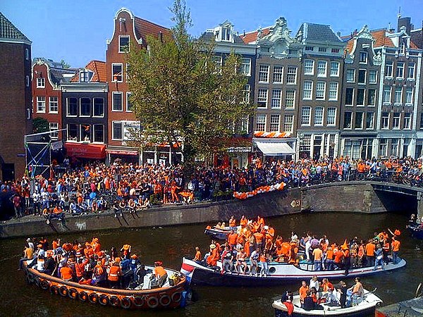 People dressed in orange on the canals of Amsterdam in 2010