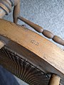 Antique chair with caning seat markers mark