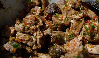 <span class="mw-page-title-main">Asun</span> Spiced Nigerian ethnic Yoruba barbecue meat delicacy