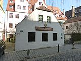 Augsburg, Schwibbogengasse 27. This is a photograph of an architectural monument. It is on the list of cultural monuments of Bayern, no. D-7-61-000-935.