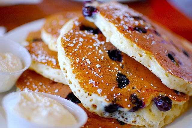 A stack of American-style blueberry pancakes