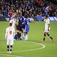 Mason (furthest left) playing for Bolton Wanderers against Chelsea in the League Cup in 2014 Chelsea 2 Bolton Wanderers 1 Chelsea progress to the next round of the Capital One cup (15165303178).jpg