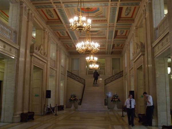 The Great Hall, originally called the Central Hall. A statue of James Craig, 1st Viscount Craigavon stands on the landing on the Imperial Staircase.