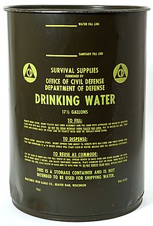 Fallout shelter water storage can: a
.mw-parser-output .frac{white-space:nowrap}.mw-parser-output .frac .num,.mw-parser-output .frac .den{font-size:80%;line-height:0;vertical-align:super}.mw-parser-output .frac .den{vertical-align:sub}.mw-parser-output .sr-only{border:0;clip:rect(0,0,0,0);clip-path:polygon(0px 0px,0px 0px,0px 0px);height:1px;margin:-1px;overflow:hidden;padding:0;position:absolute;width:1px}
66 liters (17+1/2 U.S. gal) barrel issued by the U.S. Department of Defense, Office of Civil Defense. 1963 Fallout shelter water storage can.jpg