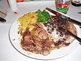 A typical Brazilian Feijoada, a stew of beans with beef and pork