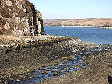 The remains of a stone pier at Fiskavaig Bay where Fiskavaig Burn enters the bay.