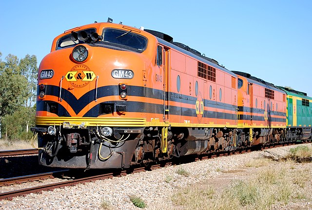 A pair of GM class locomotives lead a train in Australia