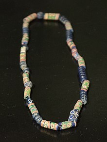 Glass necklace, 7th - 8th century, Shurdhah - Komani-Kruja culture Glass necklace, 7th - 8th century, Shurdhah - Archeological Museum of Tirana.jpg