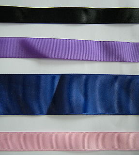 Grosgrain Plain-woven fabric with weft-wise ribbing, often woven in ribbon widths