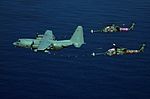 HC-130P and HH-60Gs California ANG over the Pacific 2012.jpg