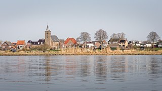 Wilsum. (St Lambertus Church) View (over the IJssel) on Wilsum. (St Lambertus Church.) We look to the east.