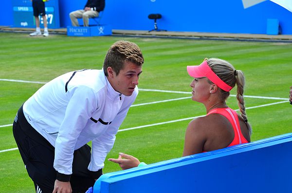 Mladenovic with her brother Luka at the 2015 Birmingham Classic
