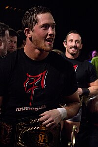 Fish (right) and Kyle O'Reilly appearing in Ring of Honor as the tag team "reDRagon" in April 2013. The duo held the ROH World Tag Team Championship on three occasions from 2013 to 2014. Kyle O'Reilly and Bobby Fish.jpg