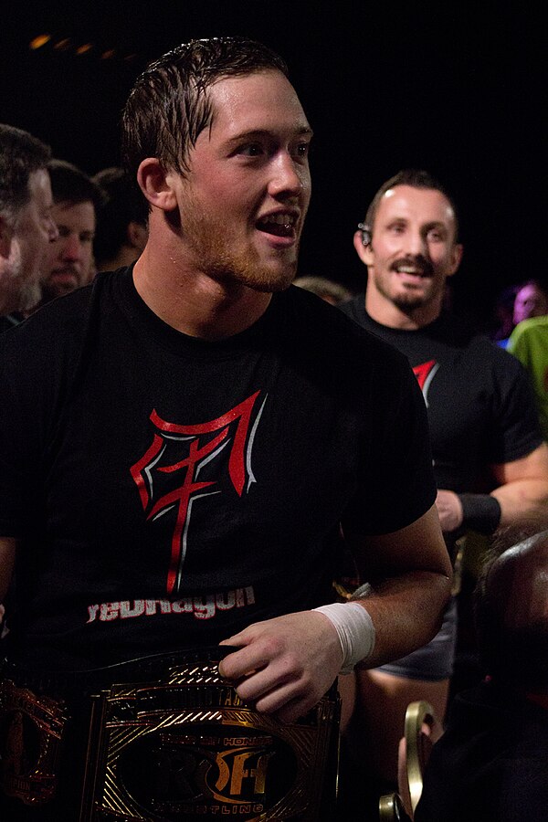 reDRagon (Kyle O'Reilly [front] and Bobby Fish [back]), who defended the IWGP Junior Heavyweight Tag Team Championship at Wrestle Kingdom 9