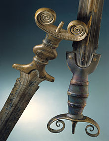 Antenna swords of the Hallstatt B period (c. 10th century BC), found near Lake Neuchatel (in Auvernier and Cortaillod; Latenium inv. nr. AUV-40315 and CORT-216, respectively) Latenium-epees-bronze.jpg