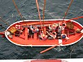 Launching a lifeboat during a mandatory drill.