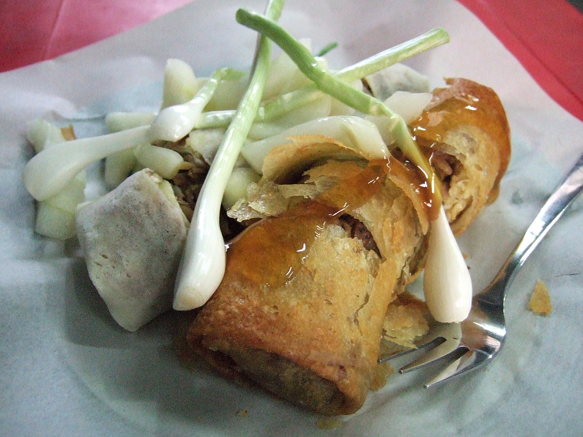 Goat in Banana Leaves with Spicy Peanut Sauce