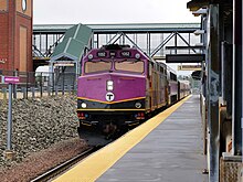 A Lowell line train at Anderson/Woburn RTC MBTA commuter rail train at Anderson RTC, 2023.jpg